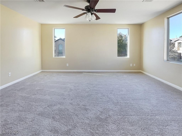 unfurnished room featuring carpet floors and ceiling fan