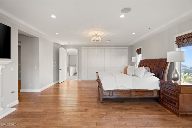 bedroom with light hardwood / wood-style flooring