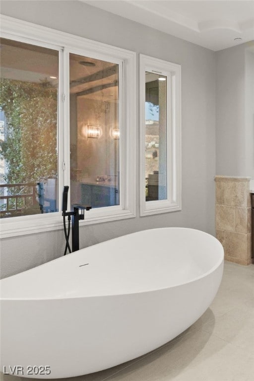 bathroom with a tub