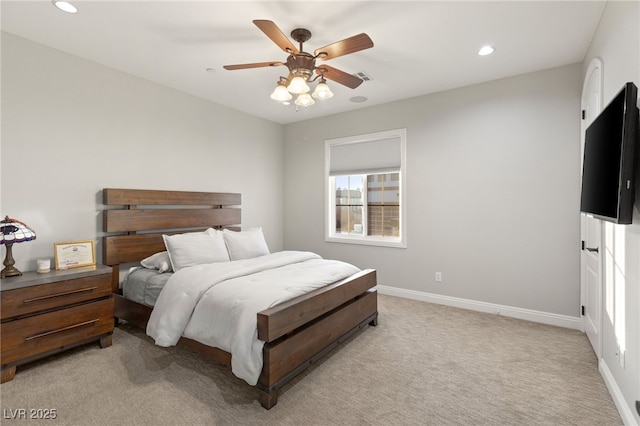 carpeted bedroom with ceiling fan