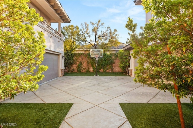 view of patio / terrace with a garage