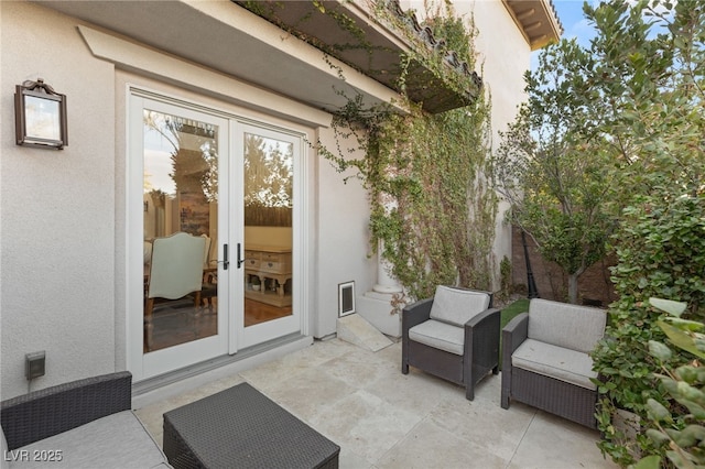 view of patio featuring french doors