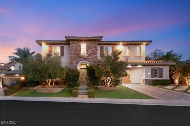 mediterranean / spanish-style home featuring a garage