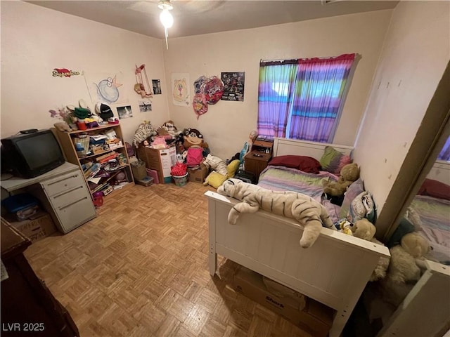 bedroom featuring light parquet floors