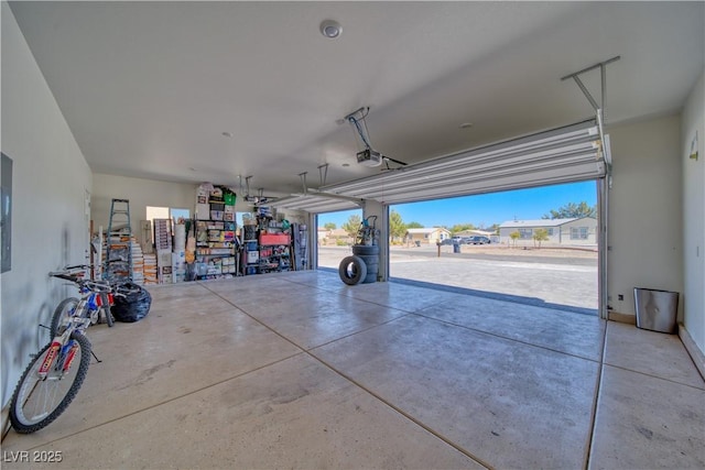 garage featuring a garage door opener