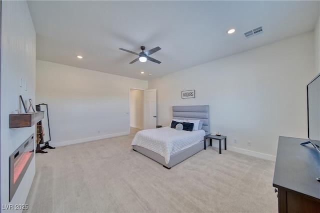 bedroom with light carpet and ceiling fan