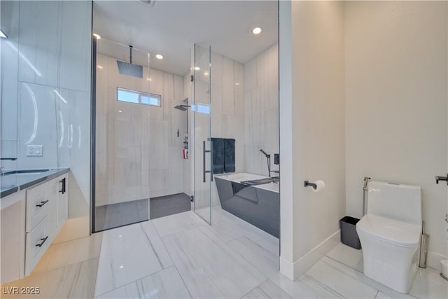 full bathroom with vanity, shower with separate bathtub, and toilet