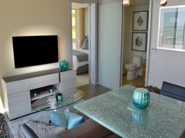 living room with light tile patterned floors