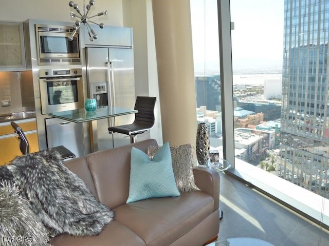 interior space featuring expansive windows and built in appliances