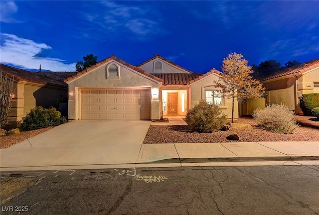 view of front of property featuring a garage