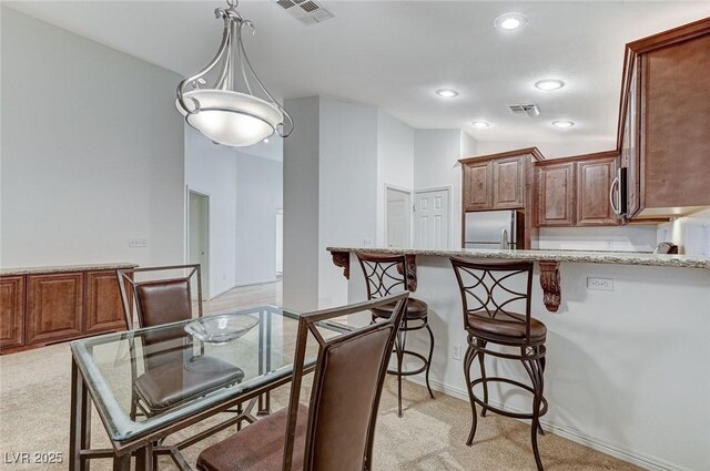 view of carpeted dining room