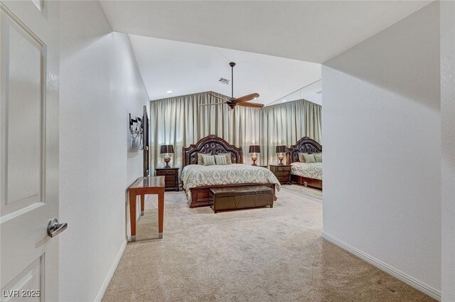 carpeted bedroom featuring vaulted ceiling