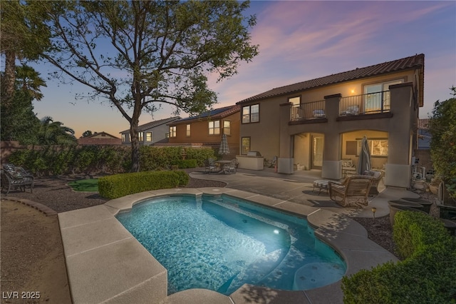 view of pool featuring a patio area