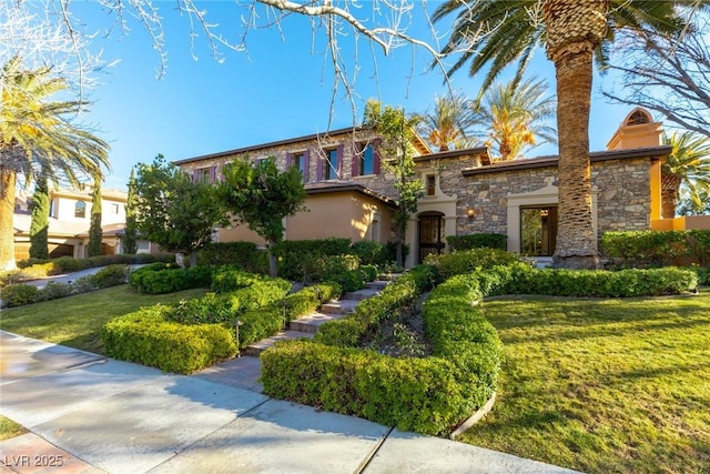 view of front of home with a front lawn