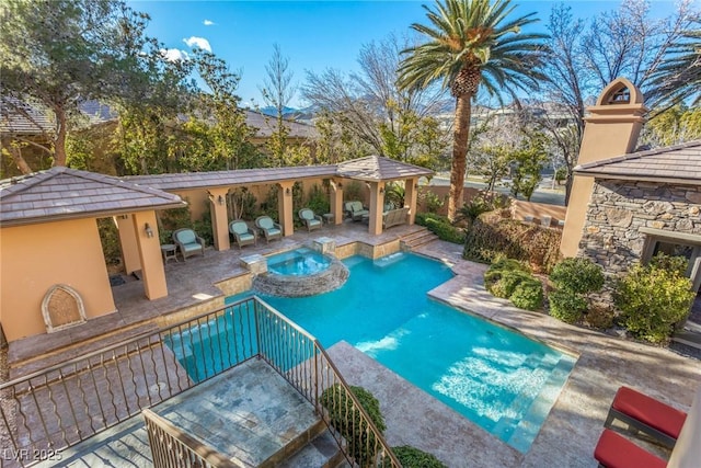 view of swimming pool featuring a gazebo, a patio area, and an in ground hot tub