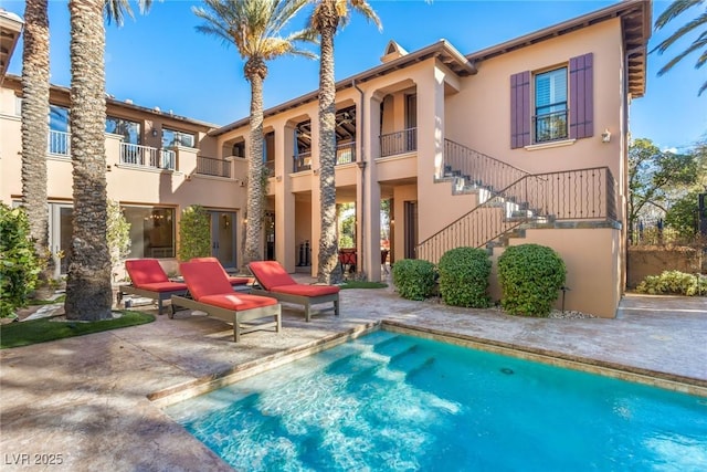 view of pool with a patio area