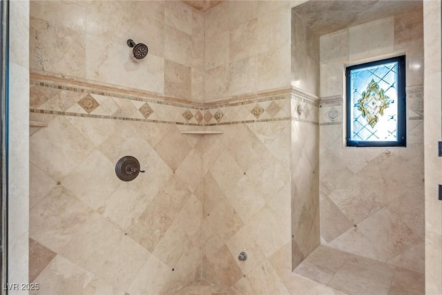 bathroom featuring tiled shower