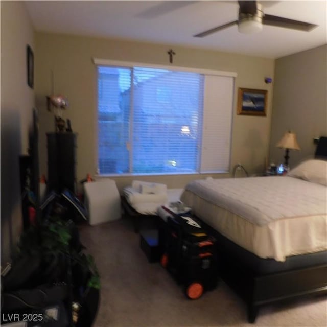 bedroom with carpet floors and a ceiling fan