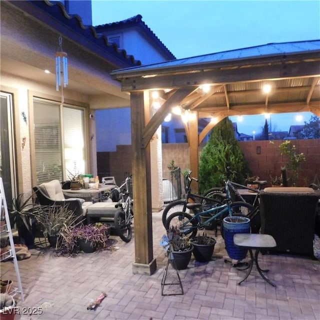 view of patio / terrace with a fenced backyard and a gazebo