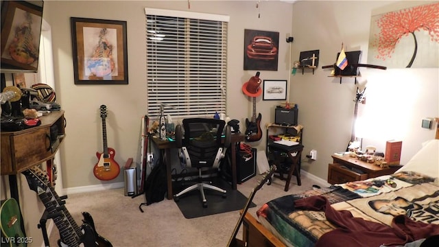 bedroom with carpet and baseboards