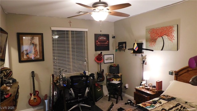 carpeted bedroom featuring ceiling fan and visible vents