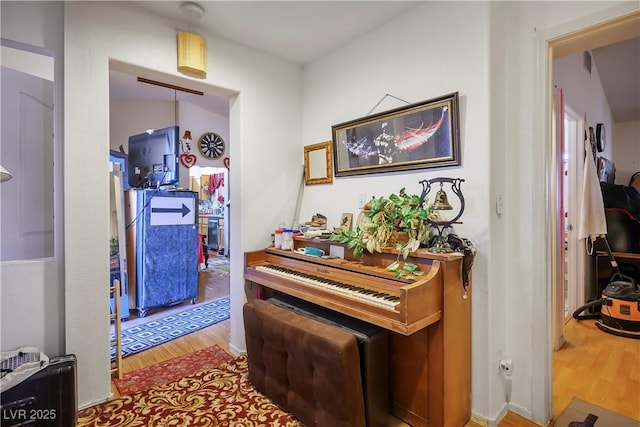 miscellaneous room with wood-type flooring