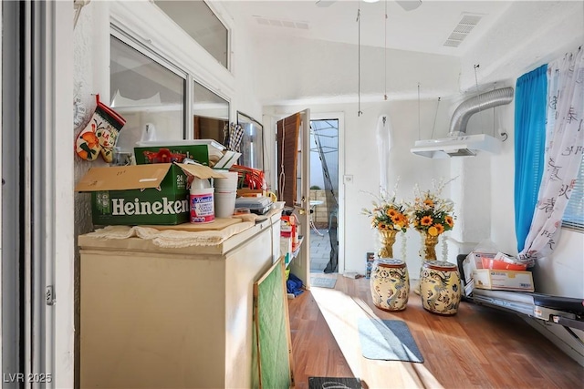 interior space with hardwood / wood-style floors