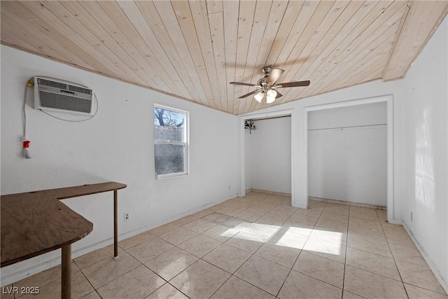 unfurnished bedroom with two closets, a wall mounted AC, wooden ceiling, and light tile patterned floors