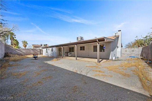 back of house featuring a patio and central AC