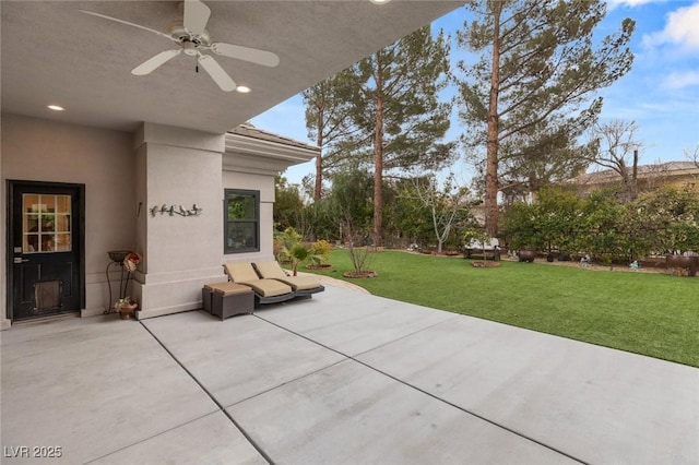 view of patio with ceiling fan