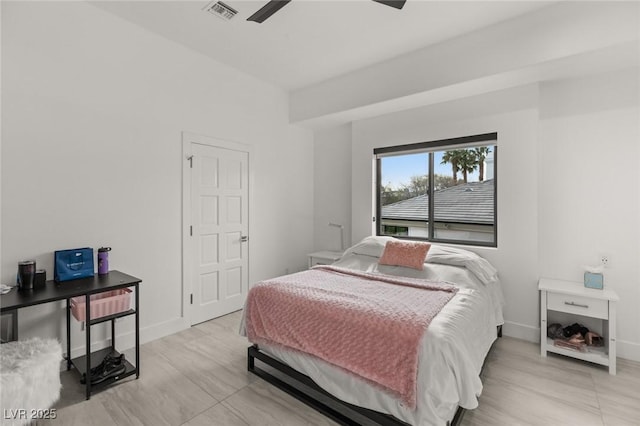 bedroom featuring light hardwood / wood-style floors and ceiling fan