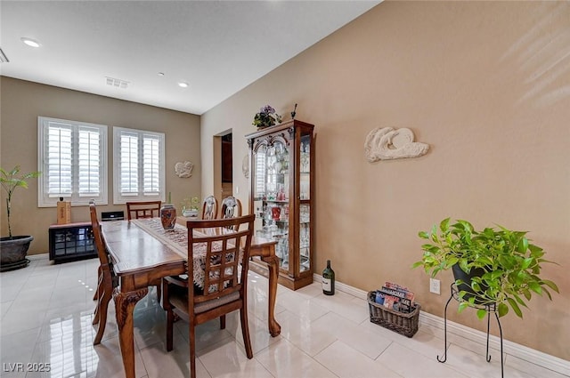 view of tiled dining space