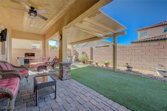 view of patio with outdoor lounge area, area for grilling, and ceiling fan