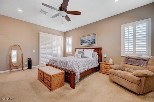 carpeted bedroom featuring ceiling fan