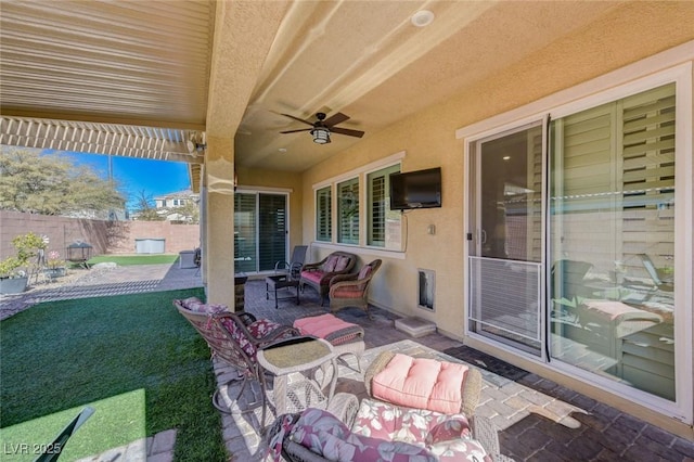 view of patio / terrace with an outdoor hangout area, ceiling fan, and a pergola