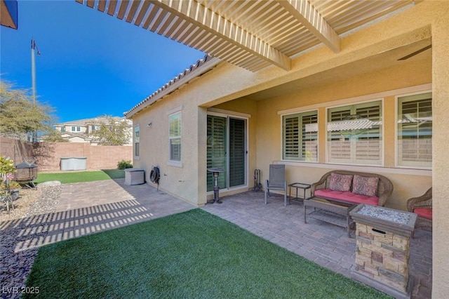 view of patio / terrace with an outdoor hangout area and a pergola