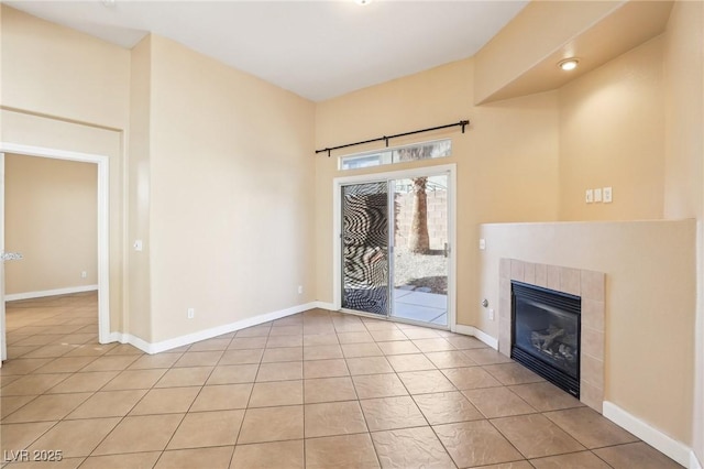 tiled entryway featuring a fireplace