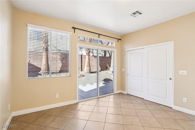 interior space with light tile patterned floors