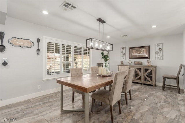 4410 E Boston Ave, Las Vegas, NV 89104 - dining area featuring an inviting chandelier