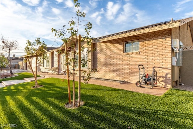 4410 E Boston Ave, Las Vegas, NV 89104 - view of property exterior featuring a lawn