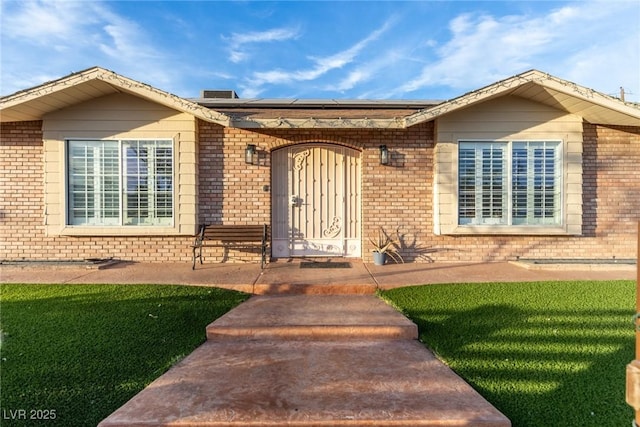 4410 E Boston Ave, Las Vegas, NV 89104 - view of exterior entry featuring a yard