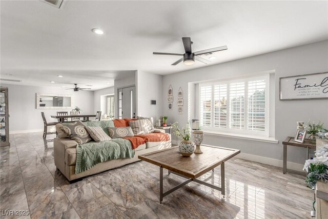 4410 E Boston Ave, Las Vegas, NV 89104 - living room with a wealth of natural light and ceiling fan