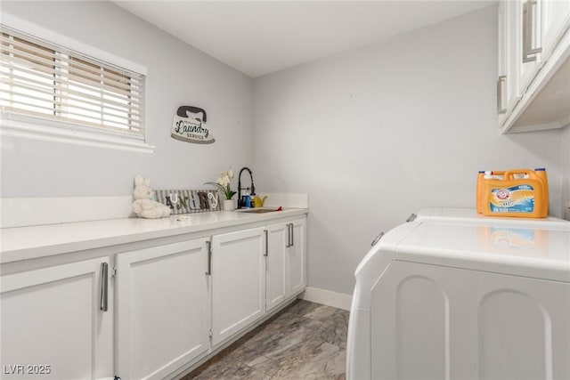 4410 E Boston Ave, Las Vegas, NV 89104 - laundry room featuring cabinets, sink, and washing machine and dryer