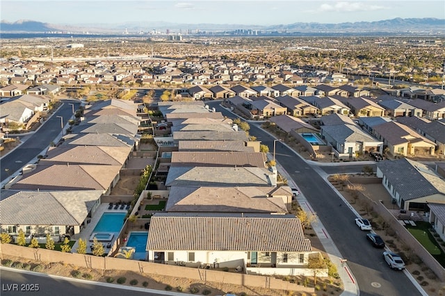 drone / aerial view featuring a mountain view