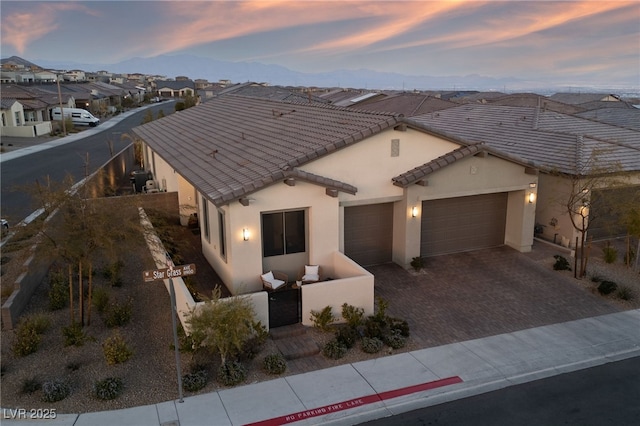 view of front of property with a garage