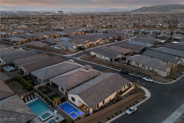 view of aerial view at dusk