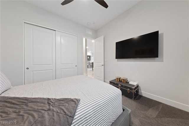 bedroom featuring ceiling fan, carpet, and a closet