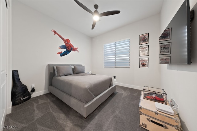 bedroom featuring ceiling fan and dark colored carpet