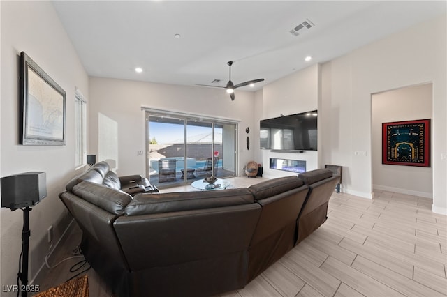 living room with ceiling fan