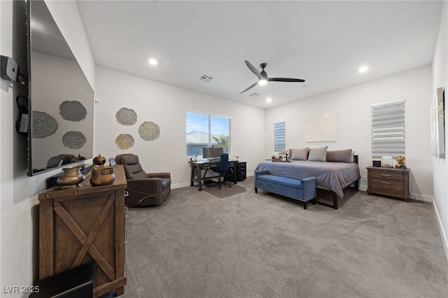 bedroom featuring light colored carpet and ceiling fan